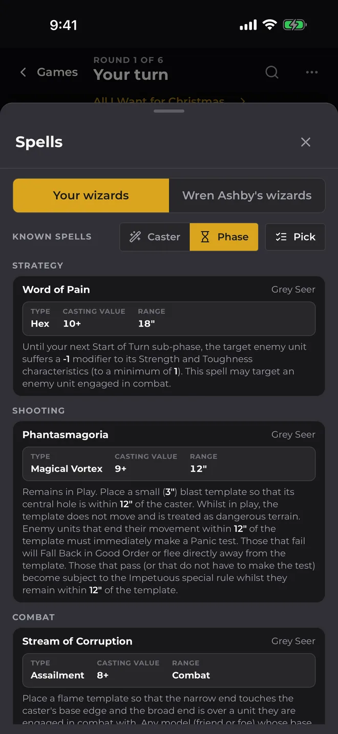 The spells panel sorted by phase, showing Strategy, Shooting and Combat spells with casting value and range