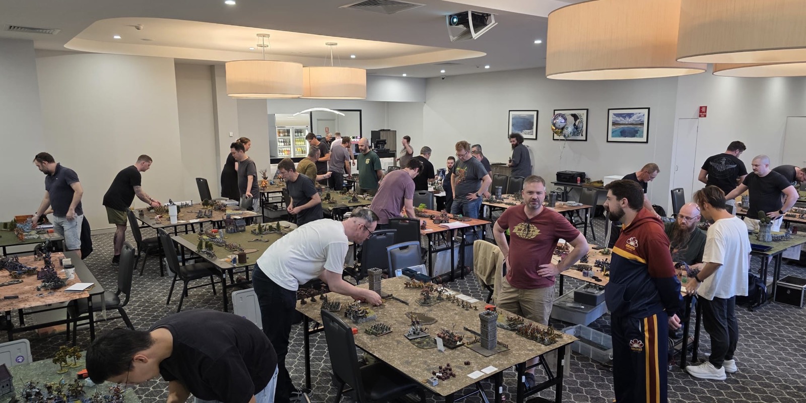 Players setting up tables at Old Hammer Cold Combat 2026